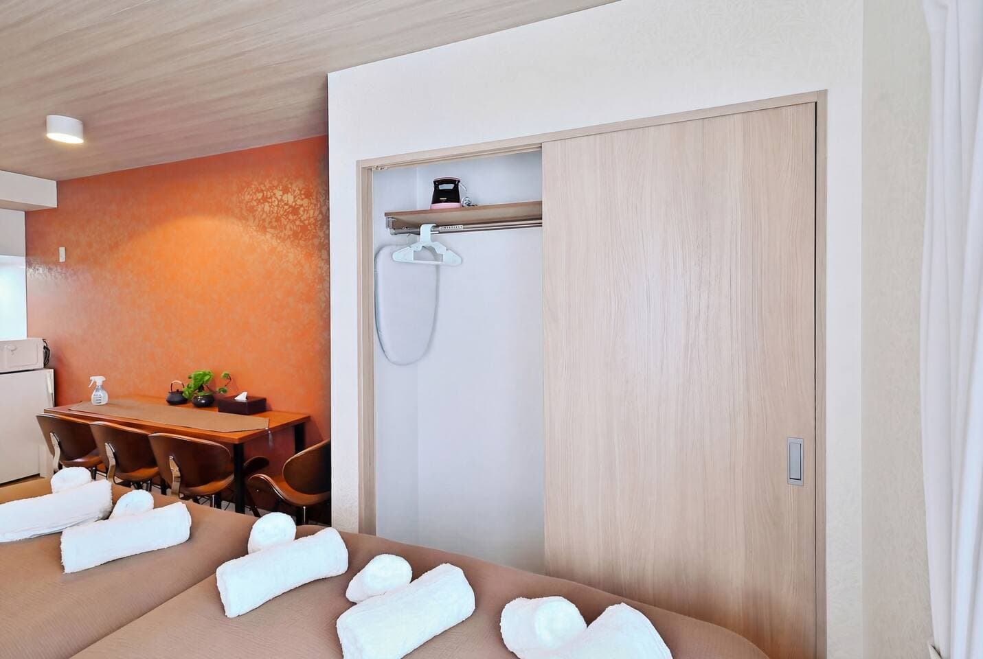  Closet Space with Hangers Included
Keep your clothes wrinkle-free with the provided hangers and clip hangers. Ideal for extended stays or business trips.
An ironing board and a steam iron are provided in the closet.