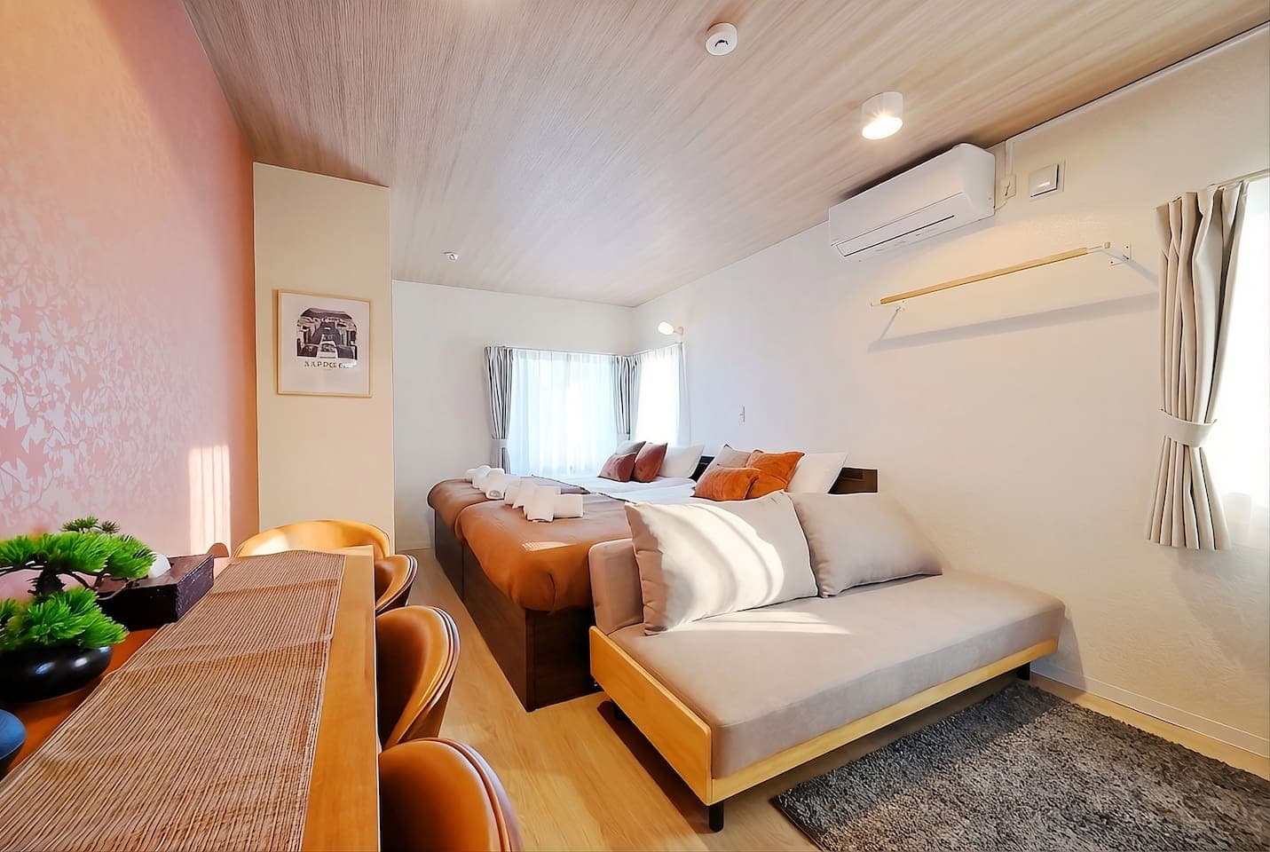 Spacious Studio with Kitchen, Dining, and Living in One
Enjoy a well-designed open-plan room featuring beds, sofa, dining table, and full kitchen—perfect for long stays or working remotely.