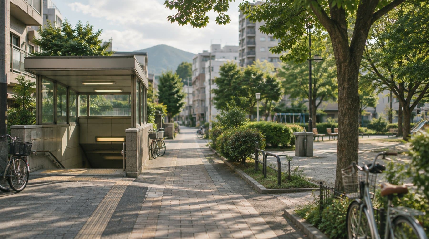A calm residential street in northern Sapporo with a subway entrance